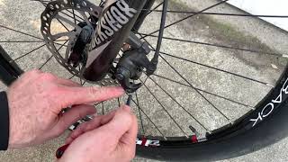 How To Adjust Mechanical Disc Brakes On A Bike [upl. by Delisle]