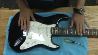 Adjusting a guitar tremolo system [upl. by Gladys]